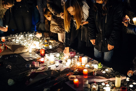 STRASBOURG, FRANCE - NOV 18, 2015: People gathering, placing flowers, messages and candles in center of Strasbourg, in solidarity for victims and families of the assault in Parisのeditorial素材