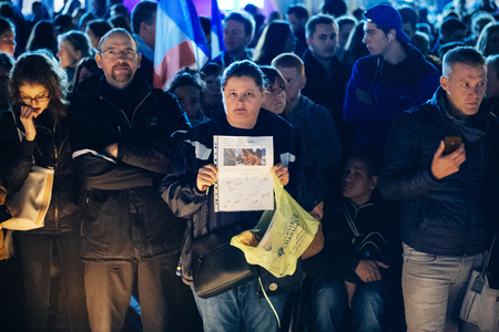 STRASBOURG, FRANCE - NOV 18, 2015: Woman with placard in center of Strasbourg, in solidarity for victims and families of the assault in Parisのeditorial素材