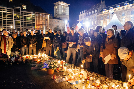 STRASBOURG, FRANCE - NOV 18, 2015: People gathering, placing flowers, messages and candles in center of Strasbourg, in solidarity for victims and families of the assault in Parisのeditorial素材