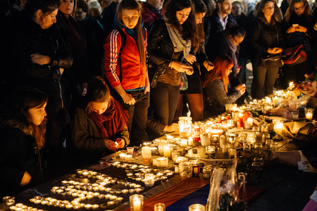 STRASBOURG, FRANCE - NOV 18, 2015: People gathering, placing flowers, messages and candles in center of Strasbourg, in solidarity for victims and families of the assault in Parisのeditorial素材