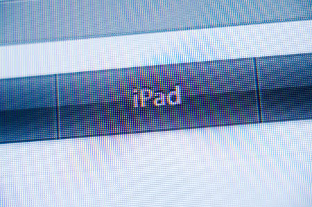PARIS, FRANCE - SEPTEMBER 11, 2011: iPhone button in the non flat design of Apple Computers webiste featuring Apple computers iconic logoのeditorial素材