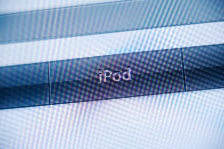 PARIS, FRANCE - SEPTEMBER 11, 2011: iPod button in the non flat design of Apple Computers webiste featuring Apple computers iconic logoのeditorial素材