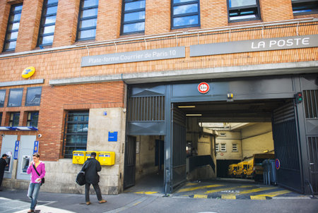 PARIS, FRANCE - AUGUST 18, 2014: La Poste branch and parcel shipping platform entrance in the heart...