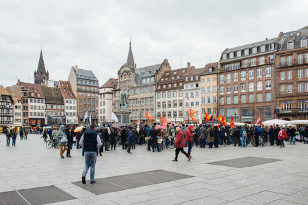 PARIS, FRANCE - JAN 30, 2016 : Protesters gathered at Kleber Square Place Kleber during a demonstration, protesting government's plan of the extension of the 'state of emergency' for another three months - people gatheringのeditorial素材