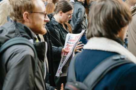 STRASBOURG, FRANCE - FEB 6, 2016: Protesters marching during a demonstration in city center against government's plan to extent the 'state of emergency' and for opened bordersのeditorial素材