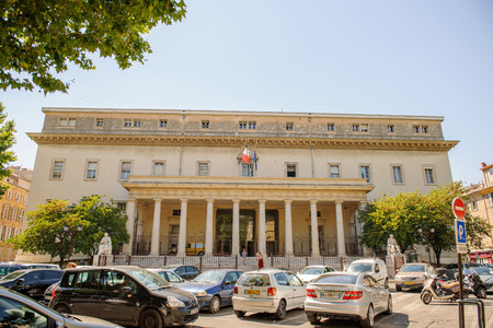 AIX-EN-PROVENCE, FRANCE - JUL 17, 2014: Cour d'appel d'Aix-en-Provence Palace of Justice of Aix-en-Provence on a sunny day with cars and pedestrians. The Palace is located in Place de Verdunのeditorial素材