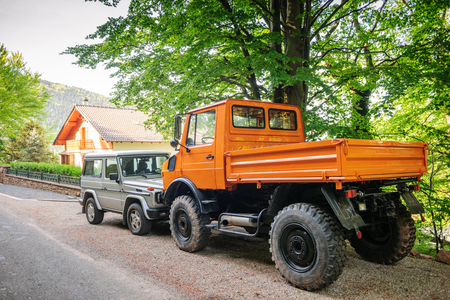 FRANCE - MAY 10, 2015: Rear view of Unimog four wheel drive vehicle and Mercedes-Benz G-Class G-Wagen short for Gelandewagen, "のeditorial素材