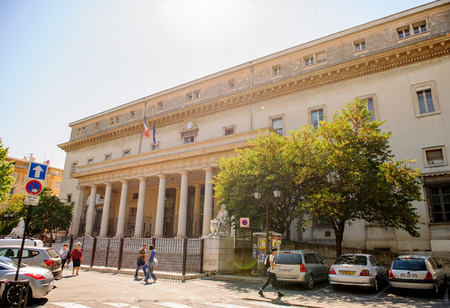AIX-EN-PROVENCE, FRANCE - JUL 17, 2014: Cour d'appel d'Aix-en-Provence Palace of Justice of Aix-en-Provence on a sunny day with cars and pedestrians. The Palace is located in Place de Verdunのeditorial素材