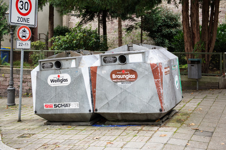 BADEN-BADEN, GERMANY - NOV 20, 2014: Bottle bank for white glass and braun glass on the streets of Baden-Baden, Germanyのeditorial素材