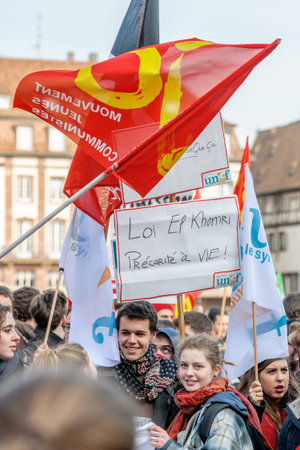 STRASBOURG, FRANCE - 9 MAR 2016: Protester looking at camera in Place Kleber as part of nationwide...
