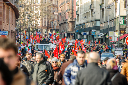 STRASBOURG, FRANCE - 9 MAR 2016: Thousands of people demonstrate as part of nationwide day of protest against proposed labor reforms by Socialist Government in the center of Strasbourgのeditorial素材