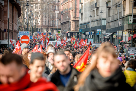 STRASBOURG, FRANCE - 9 MAR 2016: Thousands of people demonstrate as part of nationwide day of protest against proposed labor reforms by Socialist Government in the center of Strasbourgのeditorial素材