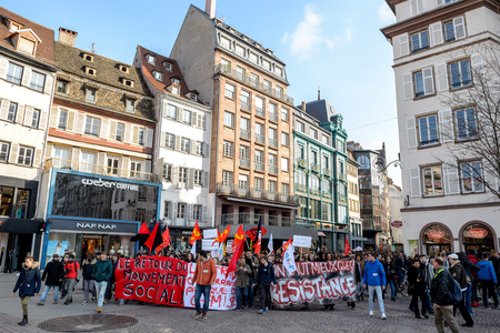 STRASBOURG, FRANCE - 9 MAR 2016: Thousands of people demonstrate in Place Kleber as part of nationwide day of protest against proposed labor reforms by Socialist Governmentのeditorial素材