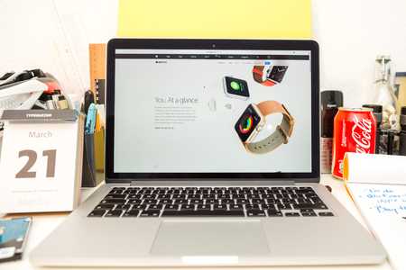 PARIS, FRANCE - MARCH 21, 2016: Apple Computers website on MacBook Pro Retina in a geek creative room environment showcasing the newly announced bands for Apple watchのeditorial素材