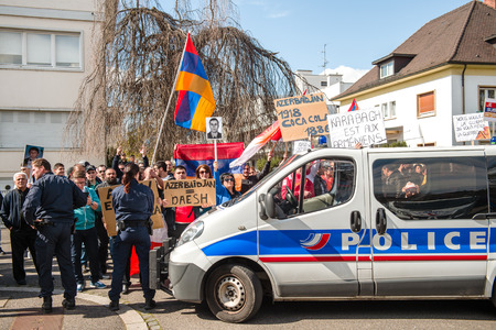 STRASBOURG, FRANCE - APR 8, 2016: Armenian diaspora protest outside Azerbaijan Embassy against the 2016 clashes in Nagorny-Karabakh, the region disputed by Armenia and Azerbaijanのeditorial素材