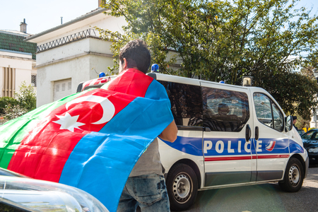 STRASBOURG, FRANCE - APR 8, 2016: Azerbaijani diaspora protest outside Azerbaijan Embassy against the 2013 clashes in Nagorny-Karabakh, the region disputed by Armenia and Azerbaijan Afterのeditorial素材