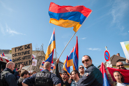 STRASBOURG, FRANCE - APR 8, 2016: Armenian diaspora protest outside Azerbaijan Embassy against the 2016 clashes in Nagorny-Karabakh, the region disputed by Armenia and Azerbaijanのeditorial素材