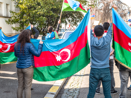 STRASBOURG, FRANCE - APR 8, 2016: Azerbaijani diaspora protest outside Azerbaijan Embassy against the 2013 clashes in Nagorny-Karabakh, the region disputed by Armenia and Azerbaijan Afterのeditorial素材