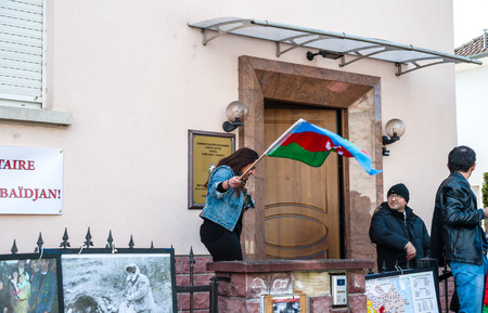 STRASBOURG, FRANCE - APR 8, 2016: Azerbaijani diaspora protest outside Azerbaijan Embassy against the 2013 clashes in Nagorny-Karabakh, the region disputed by Armenia and Azerbaijan Afterのeditorial素材