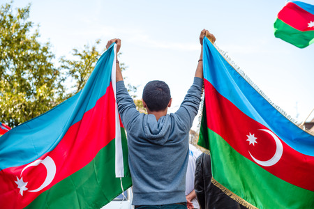 STRASBOURG, FRANCE - APR 8, 2016: Azerbaijani diaspora protest outside Azerbaijan Embassy against the 2013 clashes in Nagorny-Karabakh, the region disputed by Armenia and Azerbaijan Afterのeditorial素材