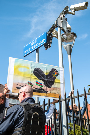 STRASBOURG, FRANCE - APR 8, 2016: Armenian diaspora protest outside Azerbaijan Embassy against the 2016 clashes in Nagorny-Karabakh, the region disputed by Armenia and Azerbaijanのeditorial素材