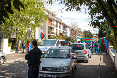 STRASBOURG, FRANCE - APR 8, 2016: Azerbaijani diaspora protest outside Azerbaijan Embassy against the 2013 clashes in Nagorny-Karabakh, the region disputed by Armenia and Azerbaijan Afterのeditorial素材