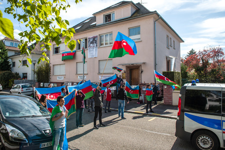 STRASBOURG, FRANCE - APR 8, 2016: Azerbaijani diaspora protest outside Azerbaijan Embassy against the 2013 clashes in Nagorny-Karabakh, the region disputed by Armenia and Azerbaijan Afterのeditorial素材