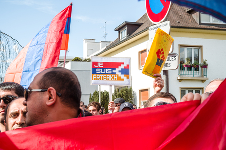 STRASBOURG, FRANCE - APR 8, 2016: Armenian diaspora protest outside Azerbaijan Embassy against the 2016 clashes in Nagorny-Karabakh, the region disputed by Armenia and Azerbaijanのeditorial素材