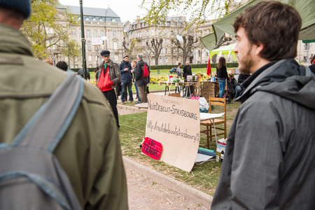STRASBOURG, FRANCE - APR 9, 2016: Young people join the 'Nuit Debout' or 'Standing night' movement at the Place de la Republique in Strasbourgのeditorial素材