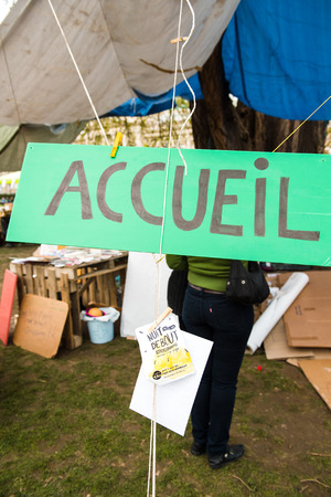 STRASBOURG, FRANCE - APR 9, 2016: Reception hand made sign at the entrance of 'Nuit Debout' or 'Standing night' movement at the Place de la Republique in Strasbourgのeditorial素材