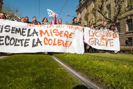 STRASBOURG, FRANCE - APR 20, 2016:Blocked tramway line as hundreds of people demonstrate on tram lines as part of nationwide day of protest against proposed labor reforms by Socialist Governmentのeditorial素材