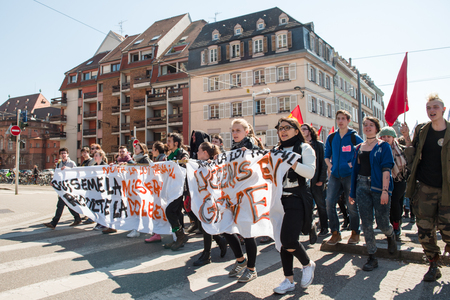 STRASBOURG, FRANCE - APR 20, 2016: Closed central street as hundreds of people demonstrate as part of nationwide day of protest against proposed labor reforms by Socialist Governmentのeditorial素材
