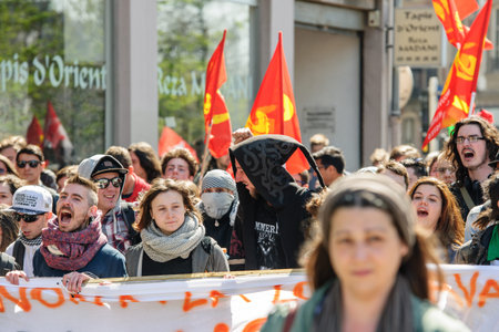 STRASBOURG, FRANCE - APR 20, 2016: Crowd yelling as hundreds of people demonstrate as part of...
