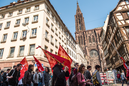 STRASBOURG, FRANCE - APR 20, 2016:  as hundreds of people demonstrate as part of nationwide day of protest against proposed labor reforms by Socialist Governmentのeditorial素材