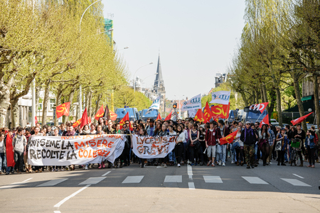 STRASBOURG, FRANCE - APR 20, 2016: Closed Avenue des Vosges as hundreds of people demonstrate as part of nationwide day of protest against proposed labor reforms by Socialist Governmentのeditorial素材