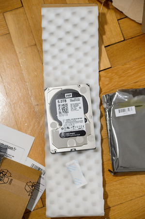 PARIS, FRANCE - MAR 18, 2016: Unboxing of Western Digital Hard disk drive with 6 Terabytes capacity. Western Digital is the biggest storage data manufacture worldwideのeditorial素材