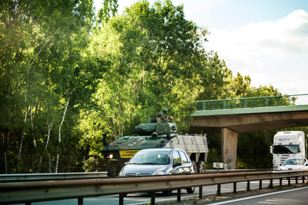 FRANCE - CIRCA 2011: French Army Tank on the street of French highway on a buy traffic jam dayのeditorial素材