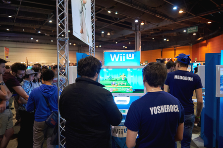 STRASBOURG, FRANCE - MAY 8, 2015: Kids and adults playing WII U game consoles at the open market Digital Game Manga Showのeditorial素材