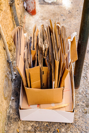 Recycling packaging boxes on a street corner in a French environmentally responsible cityの写真素材
