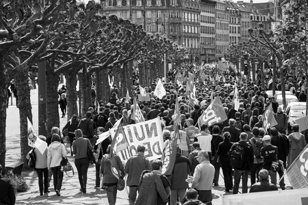 STRASBOURG, FRANCE - MAY 19, 2016: Perspective view of crowd on Place Broglie during a demonstrations against proposed French government's labor and employment law reformのeditorial素材