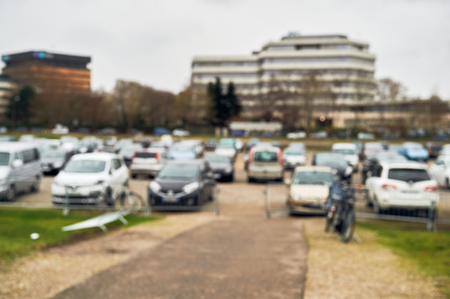 Abstract blurred car parking in urban environemntの写真素材