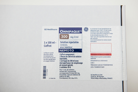 PARIS, FRANCE - JUN 15, 2016: Omnipaque box ready to be used in Medical Scanner. Iohexol is a contrast agent, sold under the trade names Omnipaque and Exypaque; this compound is also sold as a density gradient medium under the names Accudenz, Histodenz anのeditorial素材