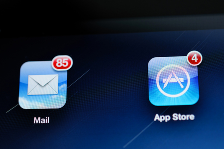 FRANKFURT, GERMANY - SEP 22, 2012: First Apple iPad Retina tablet screen detail with Mail app and App Store app taken with tilt-shift lensのeditorial素材