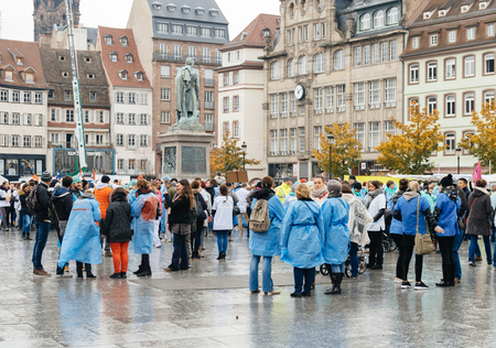 STRASBOURG, FRANCE - NOVEMBER 08: Nurses and care assistants, accompanied by student nurses march to protest against their conditions of work imposed by job cuts and economical redundancies on November 08, 2016 in Strasbourg, Franceのeditorial素材