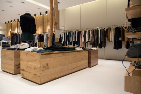 Interior of fashion store with large collection of clothes for women and menのeditorial素材
