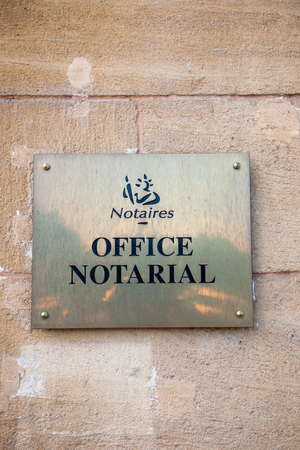 Notaire - office notarial which traslates as Notary office - A notary is a lawyer (except most of the United States) or person with legal training who is licensed by the government to perform acts in legal affairs, in particular witnessing signatures on dのeditorial素材