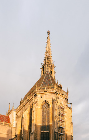 Spire detail of the Collegiale Saint-Thiebaut (Saint-Theobald collegiate church) in Thann, Haut-Rhin - one of the most ornate Gothic churches in the whole Upper Rhenish region (Alsace, Baden, North-Western Switzerland, Palatinate).の写真素材