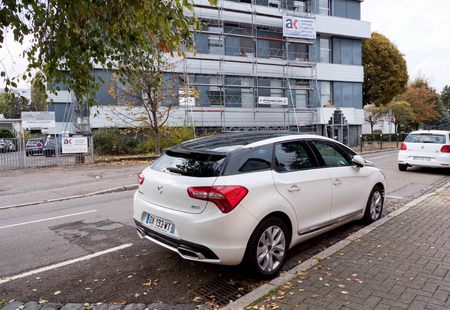 STRASBOURG, FRANCE - NOV 6 2016: Rear view of white Luxury DS 5 family van parked on French city street.The DS 5 is a upmarket large family car designed and developed by the French automaker Citroen that was launched for the European market in November 20のeditorial素材