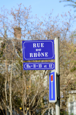 Rue du Rhone translated as Rhone street with blue house number indicators seen in French city of Mulhouse, Alsace, Franceの写真素材