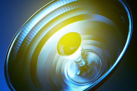 Blue light reflector in medical environment healthcare sterile room with yellow light flareの写真素材